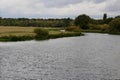 Late September view down river Ouse to Hemingford Grey water meadows from St Ives Bridge Royalty Free Stock Photo