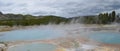 Late Spring in Yellowstone National Park: Black Opal Spring of the Sapphire Group in the Biscuit Basin Area of Upper Geyser Basin Royalty Free Stock Photo