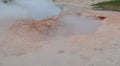 Late Spring in Yellowstone National Park: The Two Vents of Red Spouter Mud Pot of the Fountain Group in Lower Geyser Basin Royalty Free Stock Photo