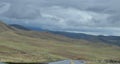 Late Spring in Southwestern Idaho: Highway Snakes Through the Rolling Hills Royalty Free Stock Photo