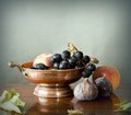 Late summer fruits in a copper bowl