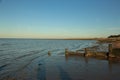 Late summer strolling over the sands on the beaches of Whitstable, Kent, UK taking in the sights and patterns in the sand made by