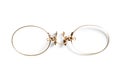 Late 19th century antique pince nez eyeglasses, isolated on whit Royalty Free Stock Photo