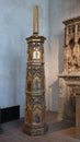 Late 15th century Spanish `Paschal Candlestick` made of wood with paint and gilding in the Cloisters in New York City.
