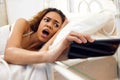 Late, time and girl morning with surprise, stress or anxiety from phone clock and overslept. Woman, shocked and wake up Royalty Free Stock Photo