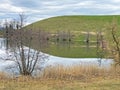 Late winter and early spring on the small natural lake Wilersee or Wiler lake above the canyon of the river Sihl, Menzingen Royalty Free Stock Photo