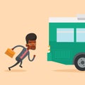 Latecomer man running for the bus. Royalty Free Stock Photo