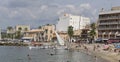 Lateen sail antique mediterranean watercraft on traditional fishing village in mallorca