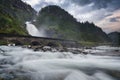 Latefossen waterfall with stone bridge near Odda, Norway