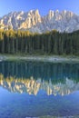 The Latemar mountain range mirrored in Lake Carezza / Karersee / Lago di Carezza