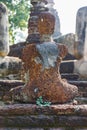 Laterite Broken Buddha Statue at Wat Pra Khaeo Kamphaeng Phet Province, Thailand