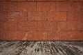 Laterite stone wall and a cement floor. Royalty Free Stock Photo
