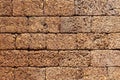 Laterite stone wall outside the building at the ancient site Royalty Free Stock Photo