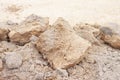 Lateritic soil heaped on the ground. Royalty Free Stock Photo