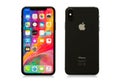 Riga, Latvia - March 25, 2018: Latest generation iPhone X on white background, front and back sides. Royalty Free Stock Photo