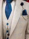 Latest trends in Suit, shirt and tie combination - White suit and tie - Navy Tie Royalty Free Stock Photo