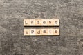 latest update word written on wood block. latest update text on table, concept Royalty Free Stock Photo