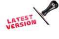 LATEST VERSION stamp text with stamper Royalty Free Stock Photo