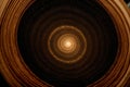 A lathe turning wood into spiraling galaxy Royalty Free Stock Photo