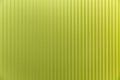 Lathed wall panel of bright light green color. Modern trends in interior design. Space for text. Front view Royalty Free Stock Photo