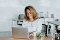 Latin adult woman eating salad lunch at the office in Mexico Latin America Royalty Free Stock Photo