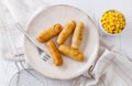 Tequenos made of fried corn filled with cheese Royalty Free Stock Photo
