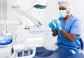 Dentist preparing special medical tools in dental office