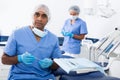 Dentist preparing special medical tools in dental office