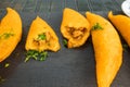 Latin American food. Traditional empanadas with beef. Wooden background