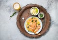 Latin American Italian dish Crudo de Salmon Raw Salmon fish platter marinated in lemon juice and spices. Top view Royalty Free Stock Photo