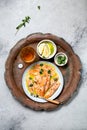 Latin American Italian dish Crudo de Salmon Raw Salmon fish platter marinated in lemon juice and spices. Top view Royalty Free Stock Photo