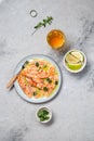 Latin American Italian dish Crudo de Salmon Raw Salmon fish platter marinated in lemon juice and spices. Top view Royalty Free Stock Photo