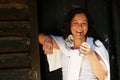 The Latin American woman drinking a mate