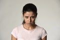 Latin angry and upset woman looking furious and crazy moody in intense anger emotion