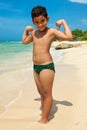 Latin boy on a tropical beach