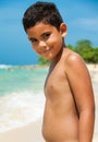 Latin boy on a tropical beach