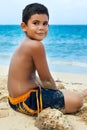 Latin boy on a tropical beach in Cuba