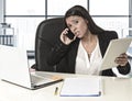 Latin business woman suffering stress working at office computer Royalty Free Stock Photo