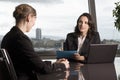 Latin businesswoman in office