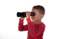 Latin child looking through binoculars