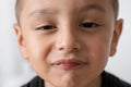 Latin child making a face of disgust and boredom Royalty Free Stock Photo