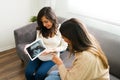 Caucasian woman talking with a doula about the gender of the baby Royalty Free Stock Photo