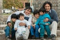 Latin family sitting in the street Royalty Free Stock Photo