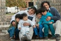 Latin family sitting in the street Royalty Free Stock Photo