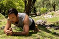 Latin Fit young man exercising in park