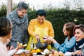 Latin grandmother and granddaughter, daughter cooking mexican food at home, three generations of women in Mexico Royalty Free Stock Photo