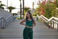 Latin and Hispanic girl, young and beautiful, dancing modern dance in the street outdoors. Dance concept, moonwalk, jumpstyle,