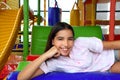 Latin indian teen girl smiling in playground Royalty Free Stock Photo