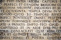 Latin inscription on the outside wall of Ara Pacis wall in Rome, Italy