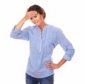 Latin lady on blue blouse with headache